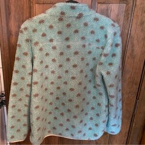 100% polyester size small in good condition.
